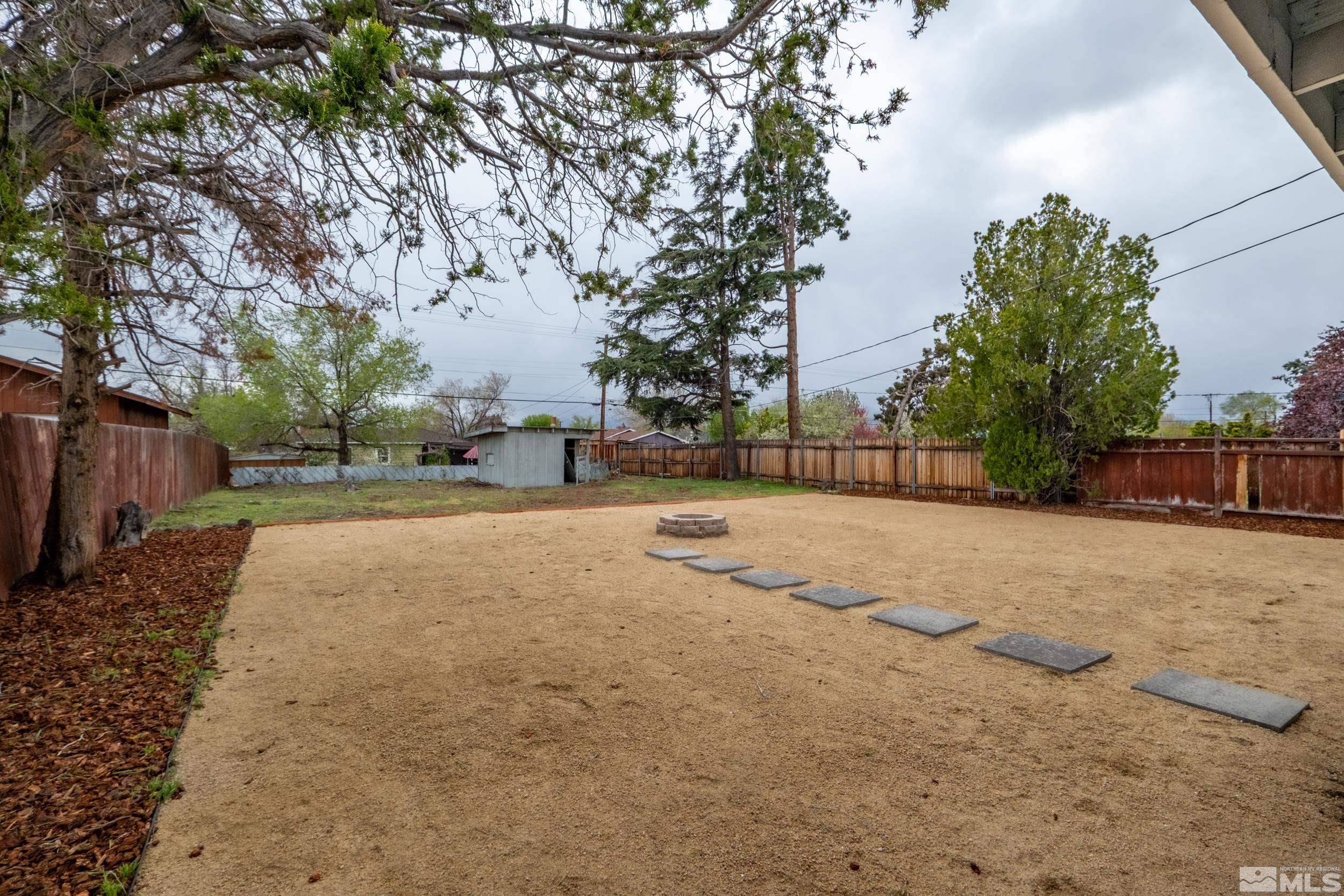1220 Vassar Street Reno, NV 89502 - Photo 26 of 36 a view of road with a yard