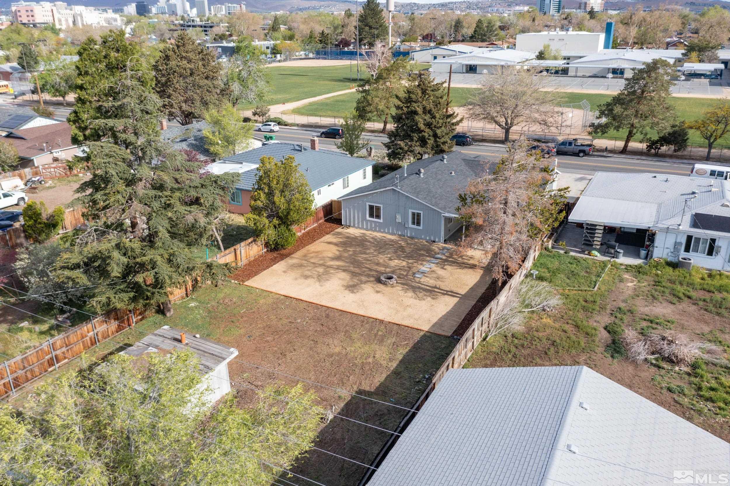 1220 Vassar Street Reno, NV 89502 - Photo 35 of 36 an aerial view of residential houses with outdoor space