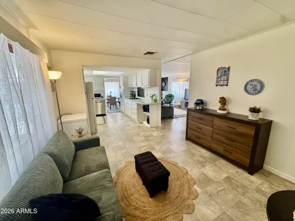 a living room with furniture and a window