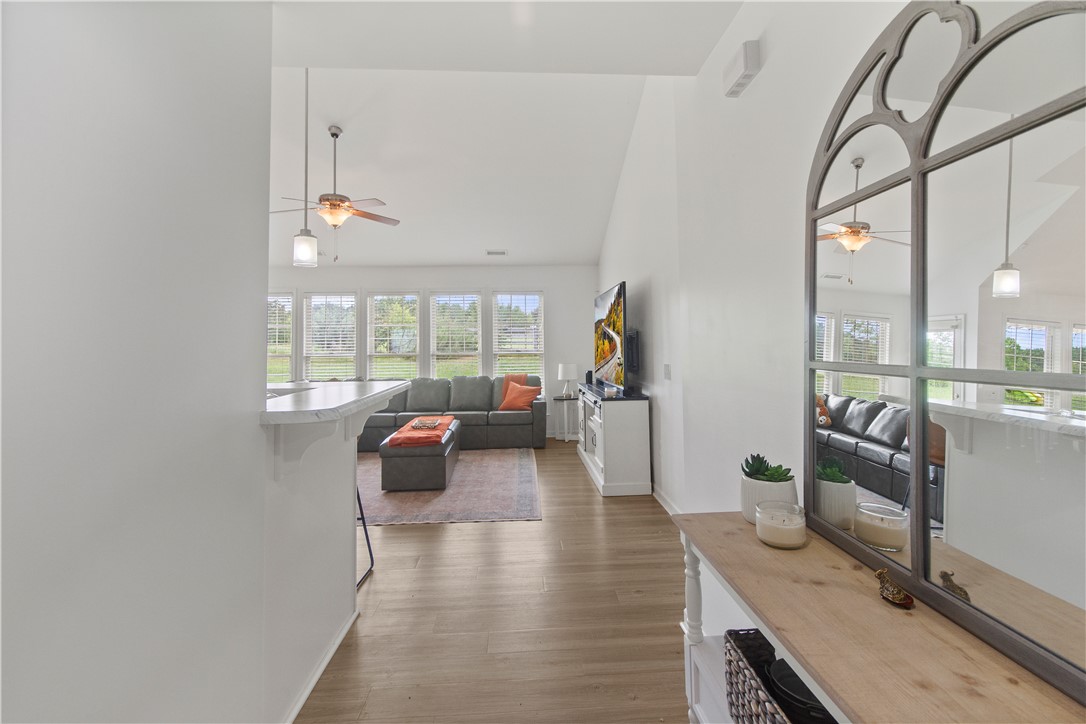 2900 Highway 187 Anderson, SC 29626 - Photo 7 of 41 An open concept living area boasts soaring vaulted ceilings and natural light from many windows.