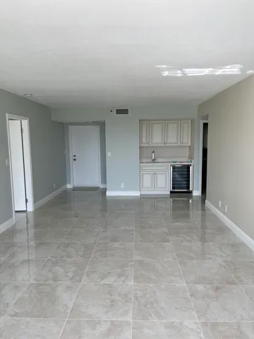 a view of kitchen and a window