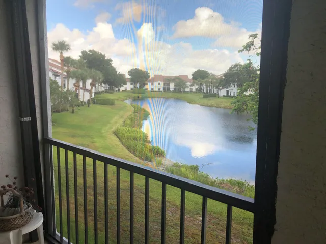 a view of a lake from a balcony