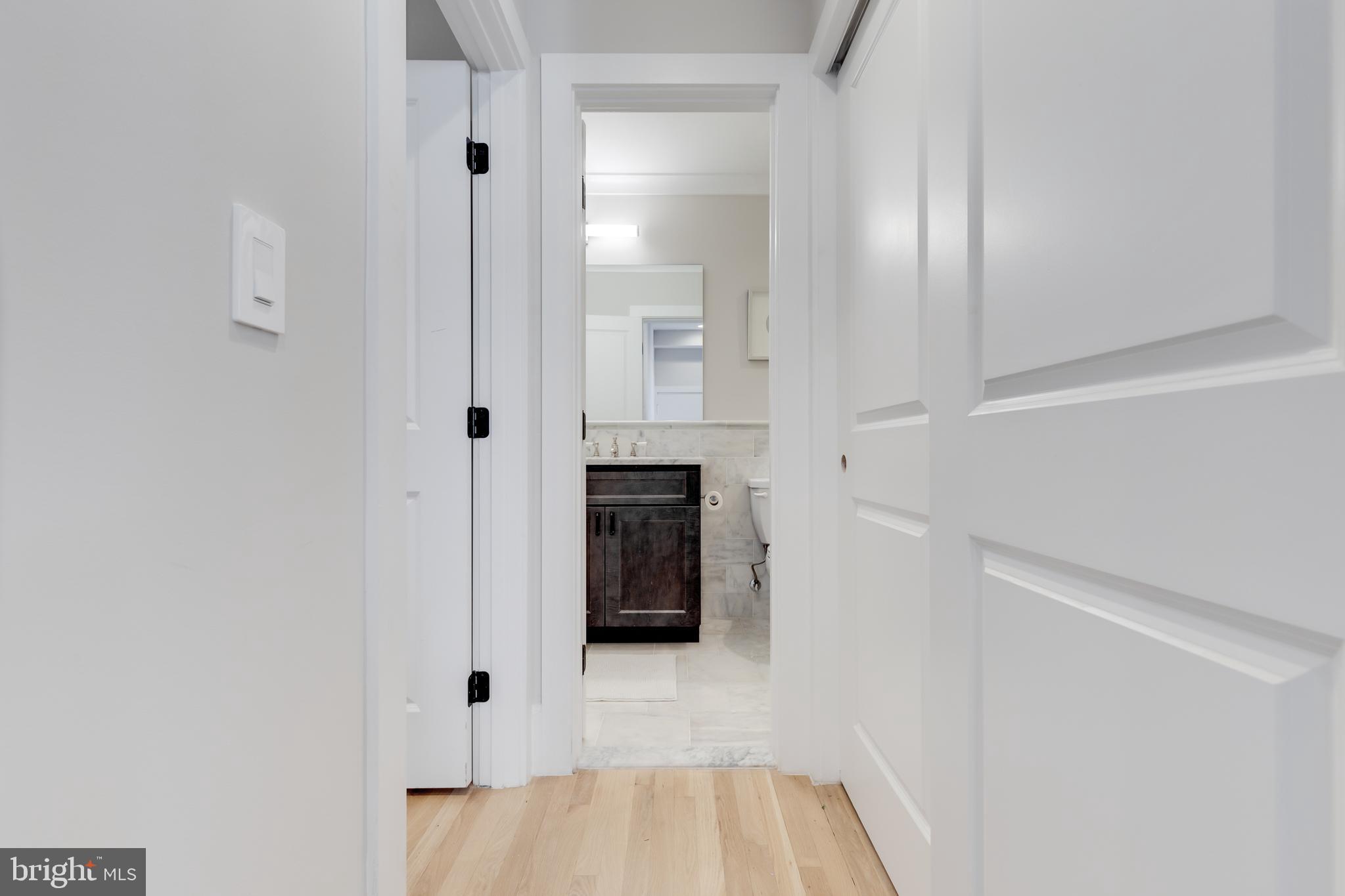1314 Vermont Avenue Northwest, Unit CH6 Washington, DC 20005 - Photo 14 of 23 a view of a hallway with white walls