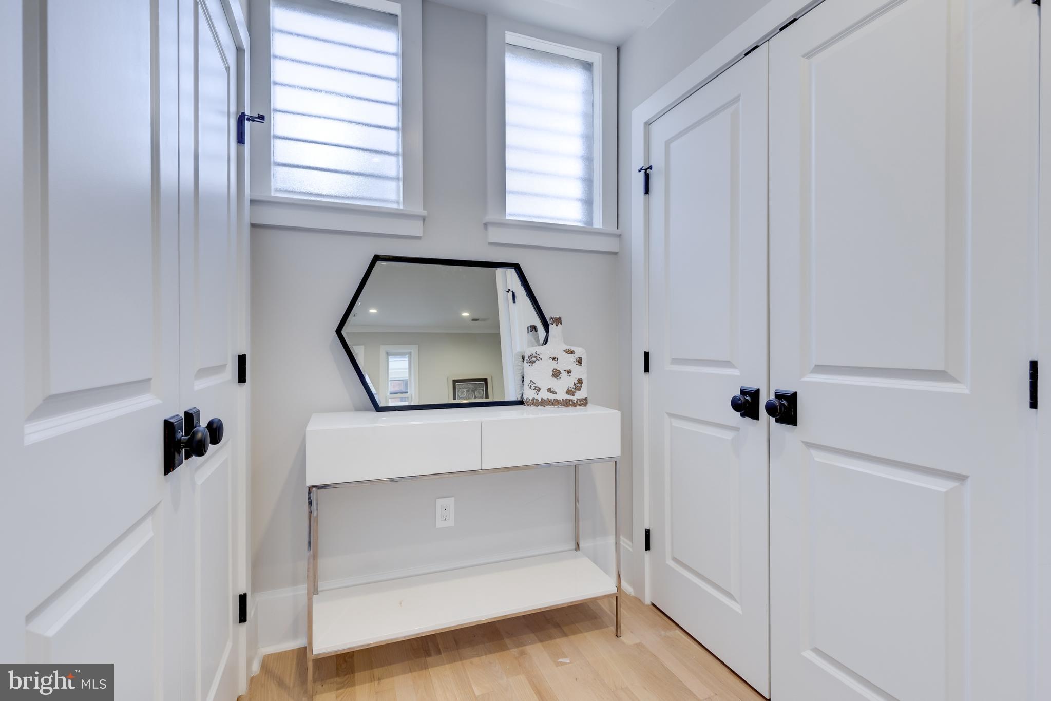 1314 Vermont Avenue Northwest, Unit CH6 Washington, DC 20005 - Photo 22 of 23 a view of living room and front door