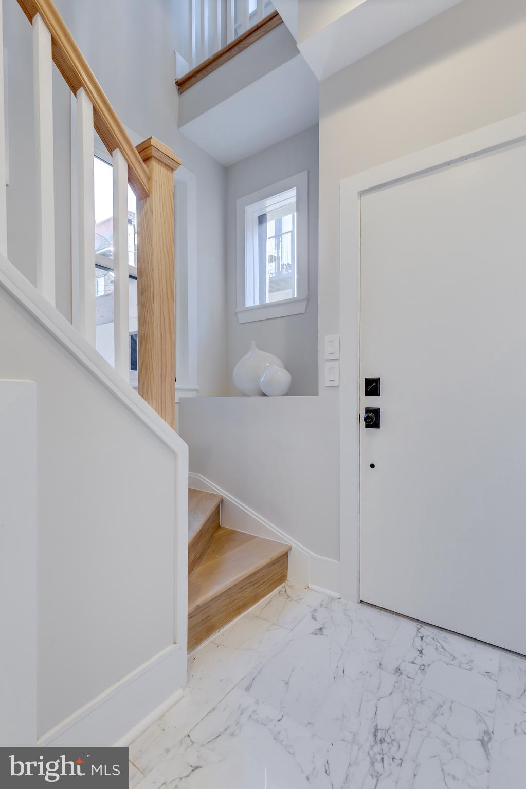 1314 Vermont Avenue Northwest, Unit CH6 Washington, DC 20005 - Photo 3 of 23 a view of an entryway with staircase
