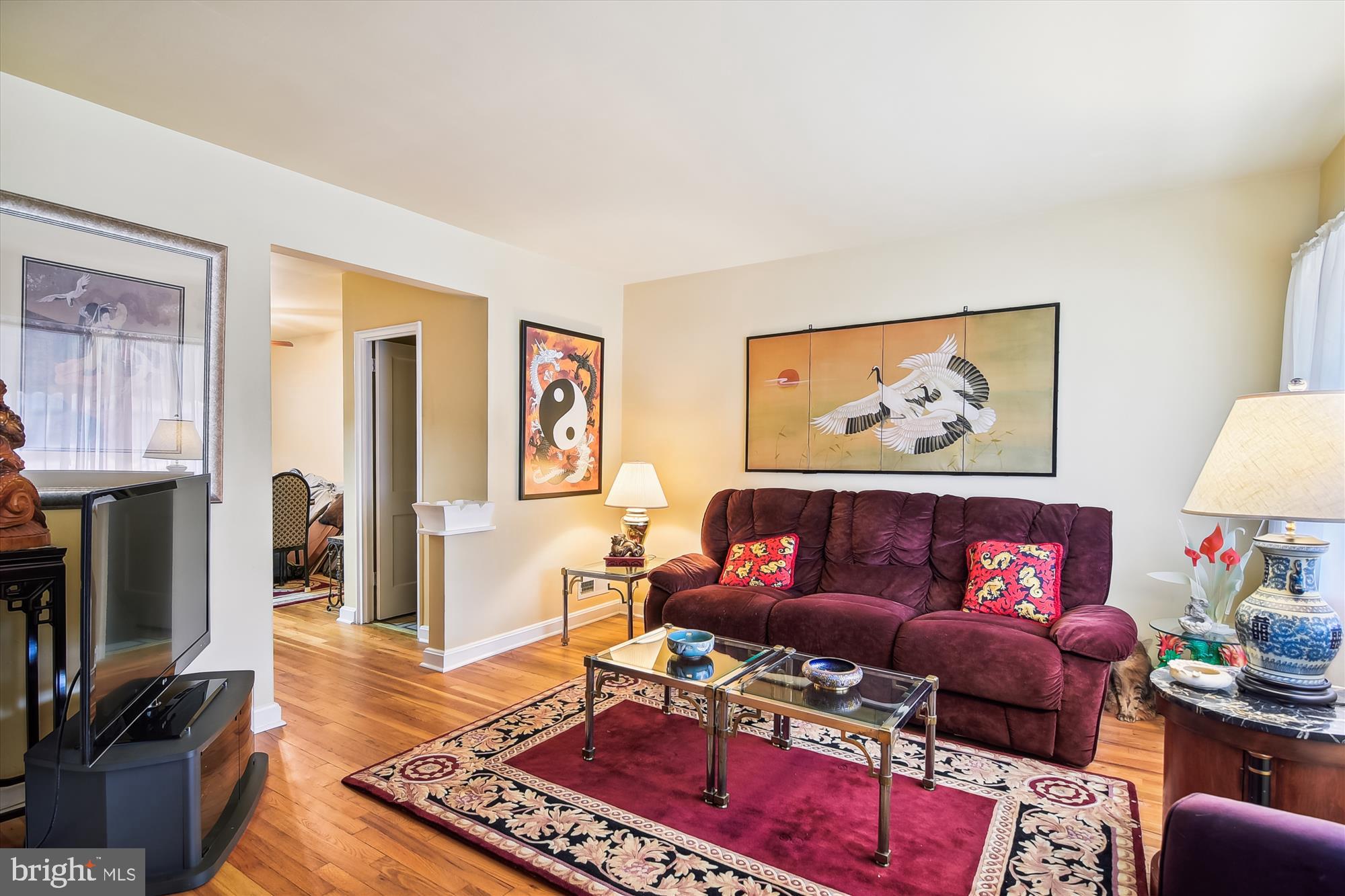 7474 Rabon Avenue Dundalk, MD 21222 - Photo 2 of 20 Gorgeous hardwood floors in the living room