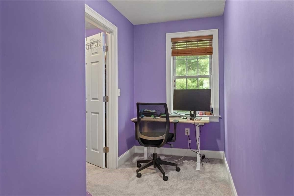 28 McIntosh Drive, Unit 22 Stow, MA 01775 - Photo 23 of 38 a view of a workspace with furniture and a window