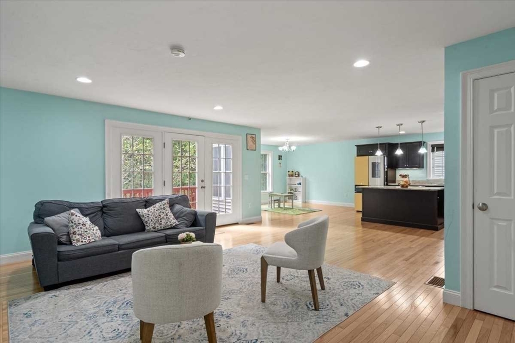 28 McIntosh Drive, Unit 22 Stow, MA 01775 - Photo 8 of 38 a living room with furniture and a couch