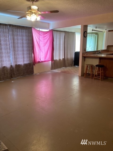 176 Boyd Road Randle, WA 98377 - Photo 25 of 25 a view of a room with wooden floor and windows