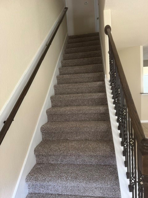 2529 Magnolia Fair Way Spring, TX 77386 - Photo 17 of 32 New carpet on stairs to second level. Beige interior paint matches the beautiful carpet and tile.
