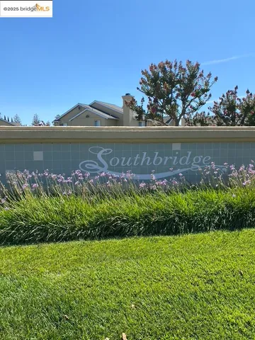 a view of a lake with a building in the background
