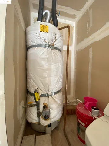 a living room with a table and chairs