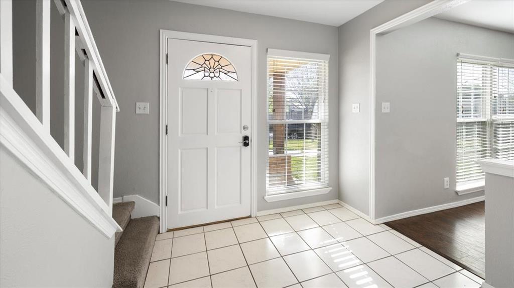 6925 Red Fox Trail Fort Worth, TX 76137 - Photo 3 of 23 Step into the foyer.