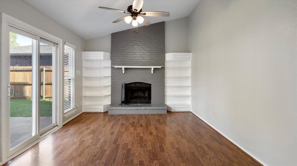 6925 Red Fox Trail Fort Worth, TX 76137 - Photo 10 of 23 Family room with wood-burning fireplace.