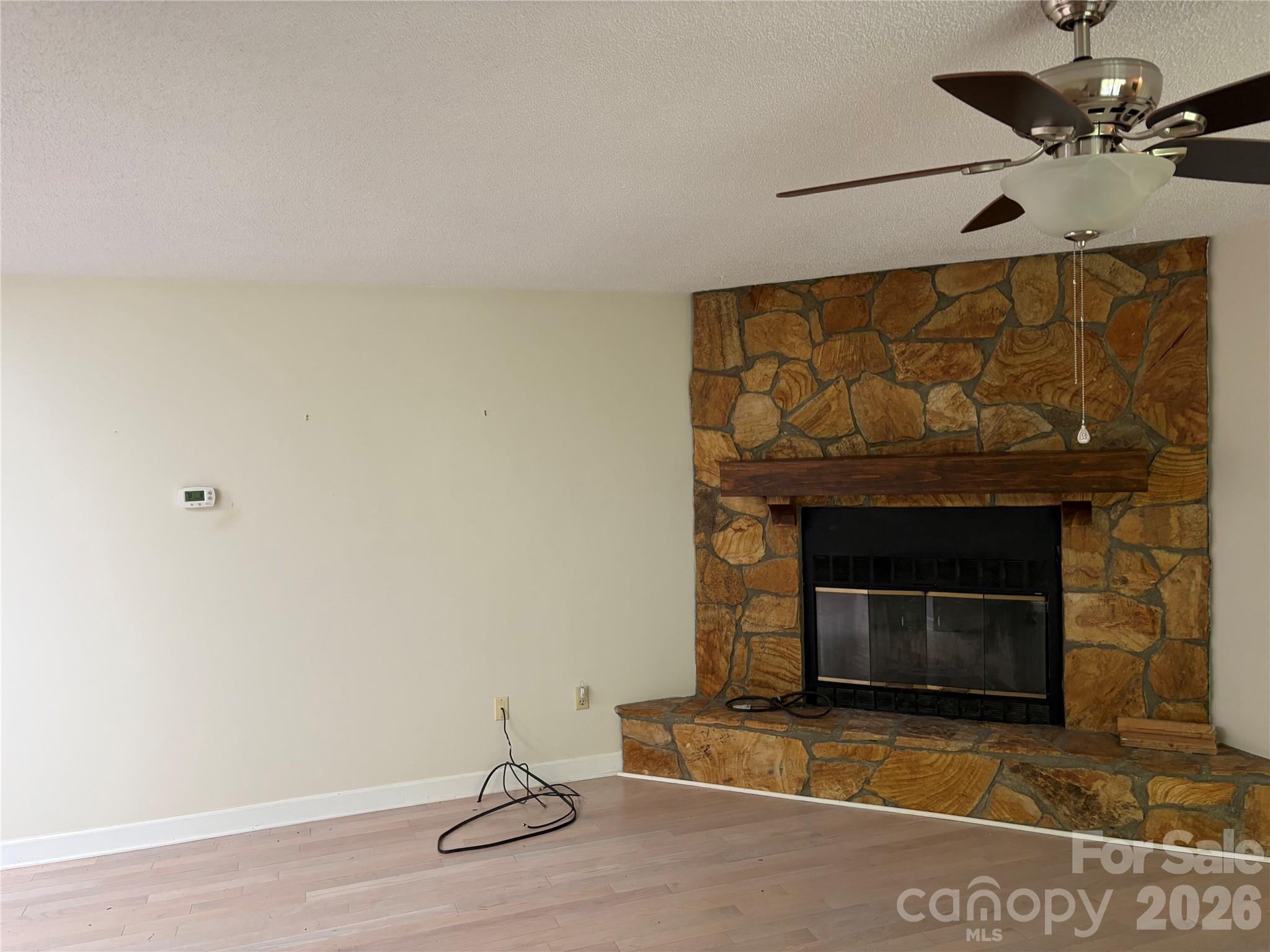 256 A Bruce Road Mars Hill, NC 28754 - Photo 8 of 39 a living room with a fireplace