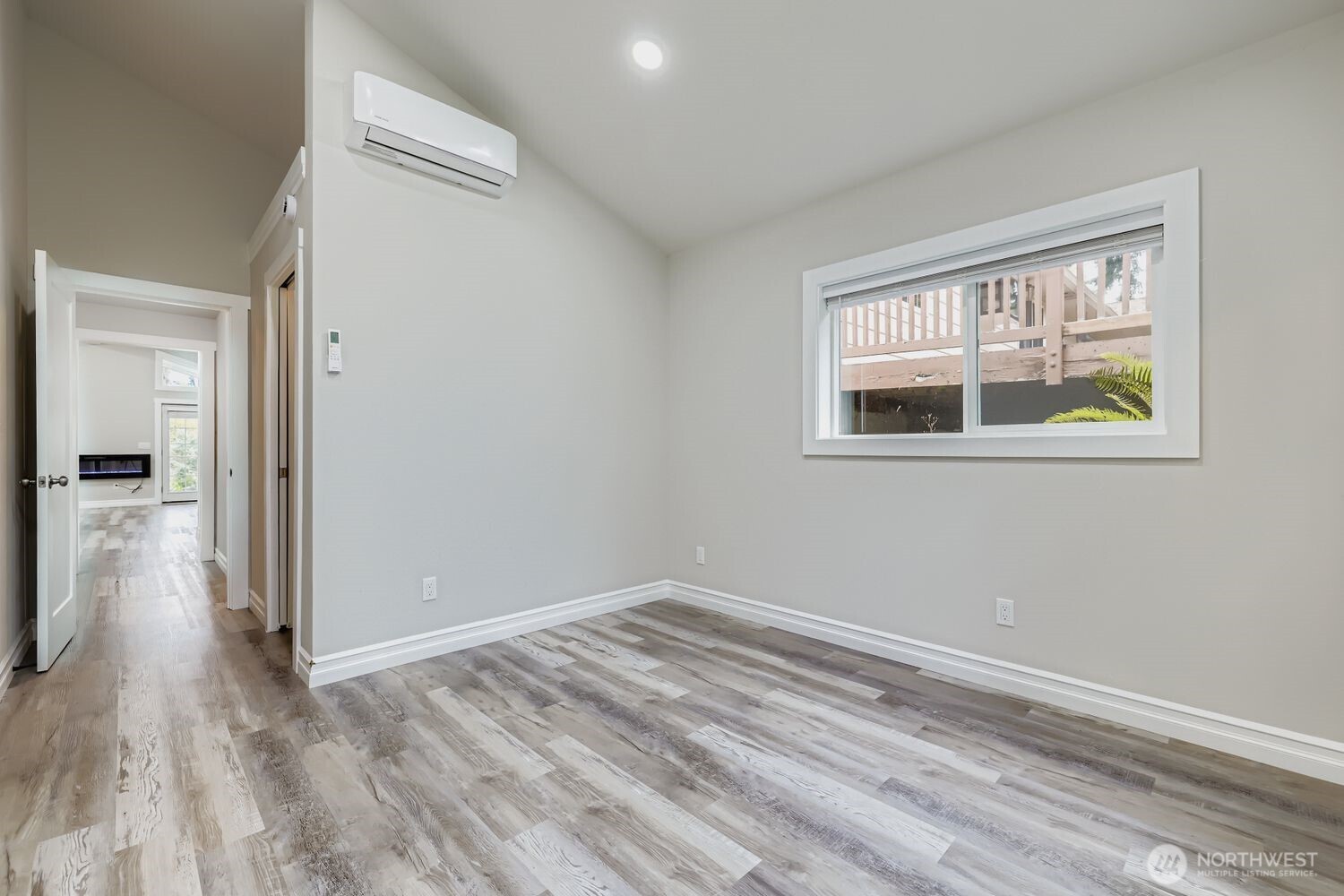 8912 229th Place Southwest, Unit B Edmonds, WA 98026 - Photo 12 of 25 wooden floor in an empty room with a window