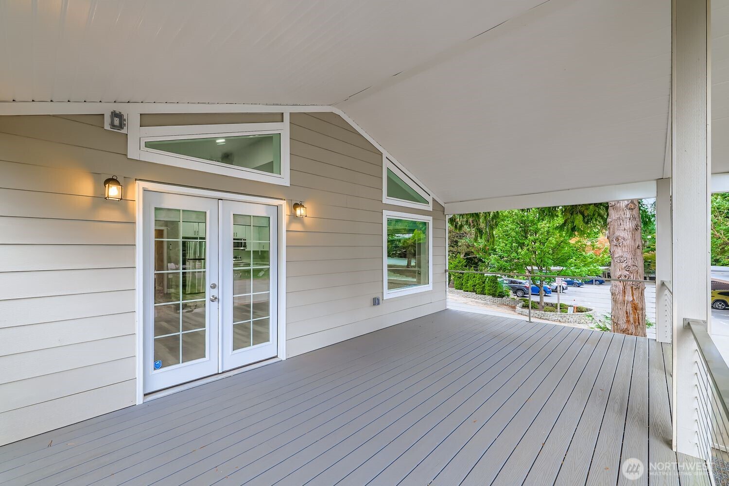 8912 229th Place Southwest, Unit B Edmonds, WA 98026 - Photo 15 of 25 a view of a house with porch and wooden floor