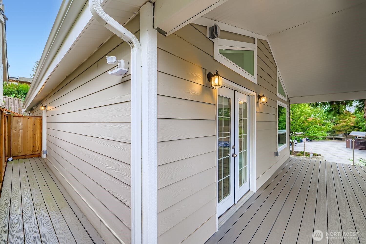 8912 229th Place Southwest, Unit B Edmonds, WA 98026 - Photo 17 of 25 a view of a balcony with wooden floor