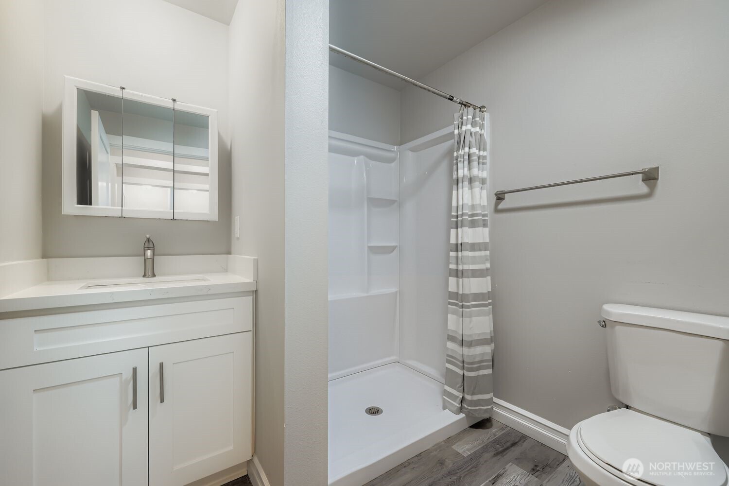 8912 229th Place Southwest, Unit B Edmonds, WA 98026 - Photo 8 of 25 a bathroom with a sink a toilet and shower