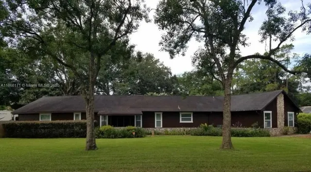 front view of house with a yard