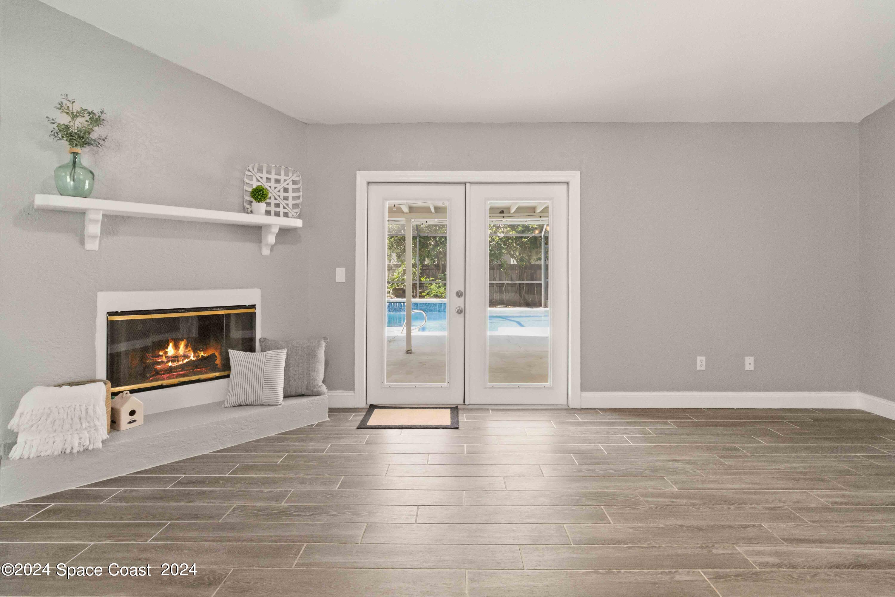 6846 Hartford Road Cocoa, FL 32927 - Photo 11 of 19 French Doors To The Pool
