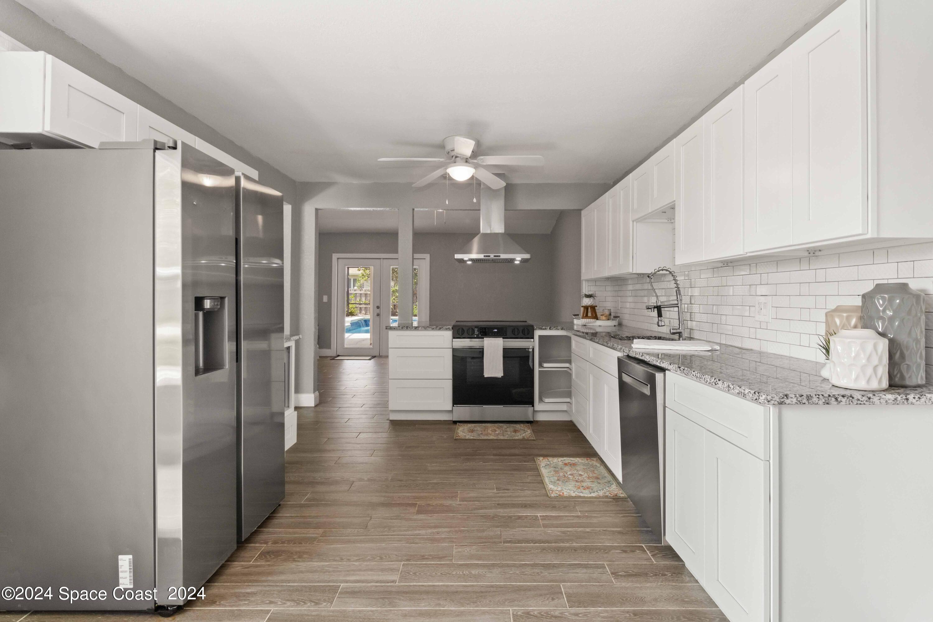 Updated Gourmet Kitchen with Granite