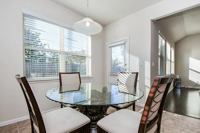 a kitchen with stainless steel appliances granite countertop a refrigerator sink and cabinets