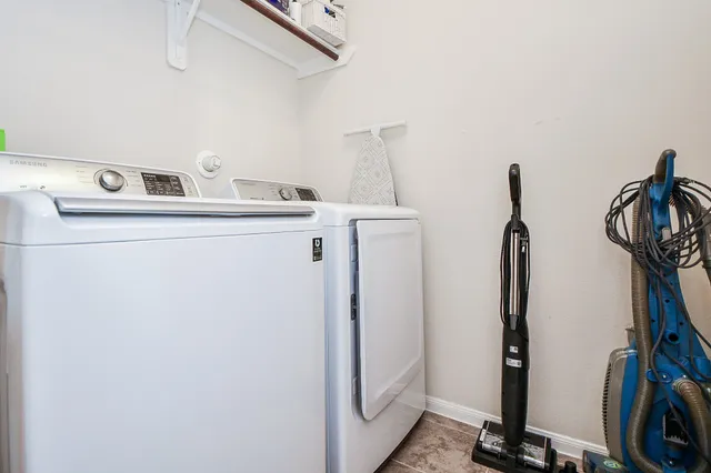 a bathroom with a sink vanity and a mirror