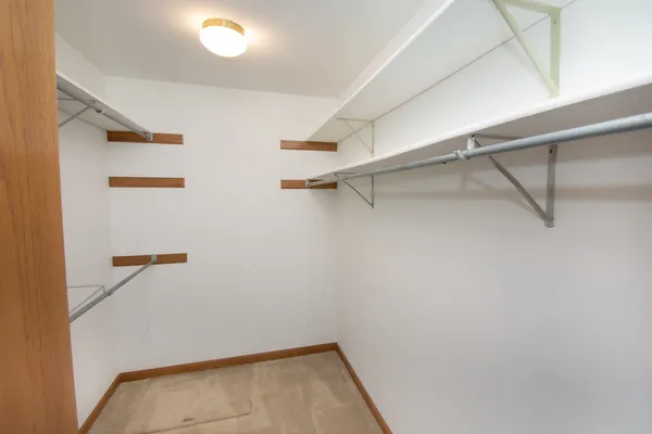 a view of a room with racks on the wall