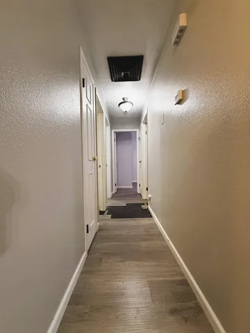 a view of hallway with stairs