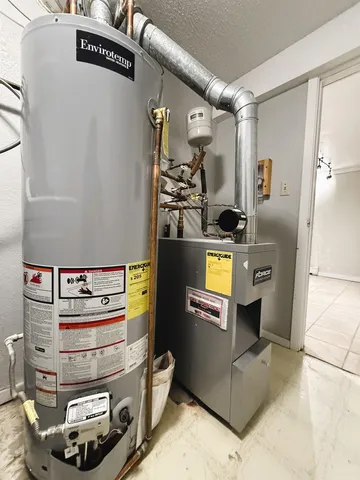 a utility room with washer and dryer