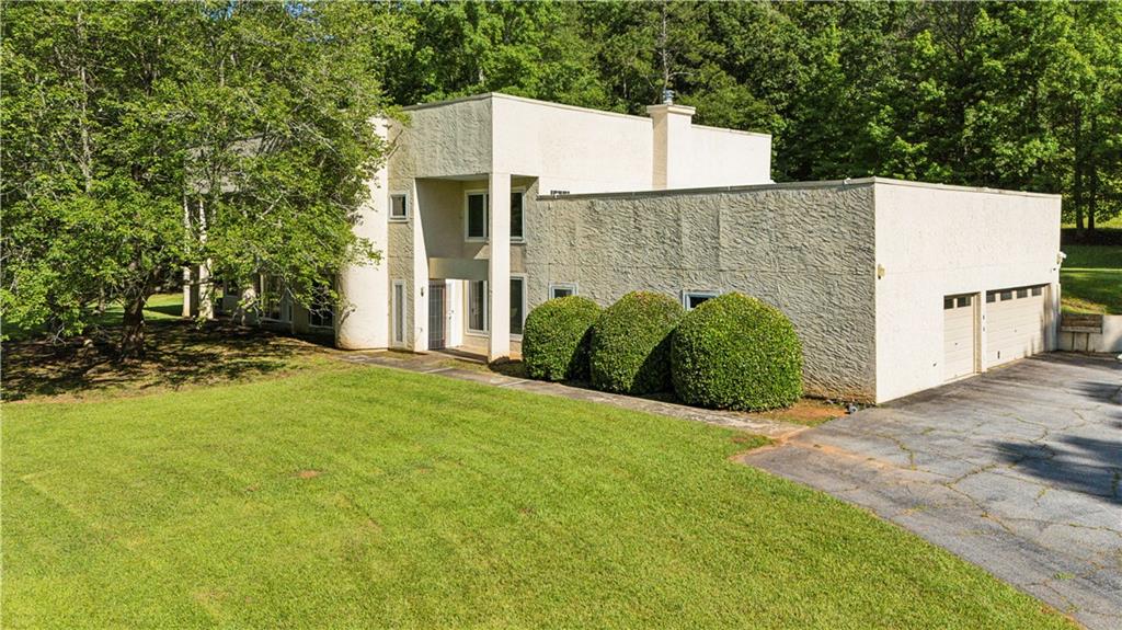 110 Bridger Point Road Fayetteville, GA 30215 - Photo 5 of 7 a view of a back yard of the house