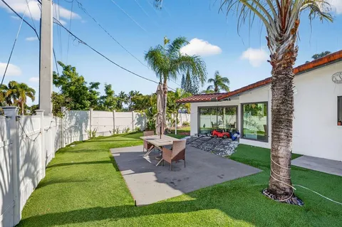 a view of yard with patio