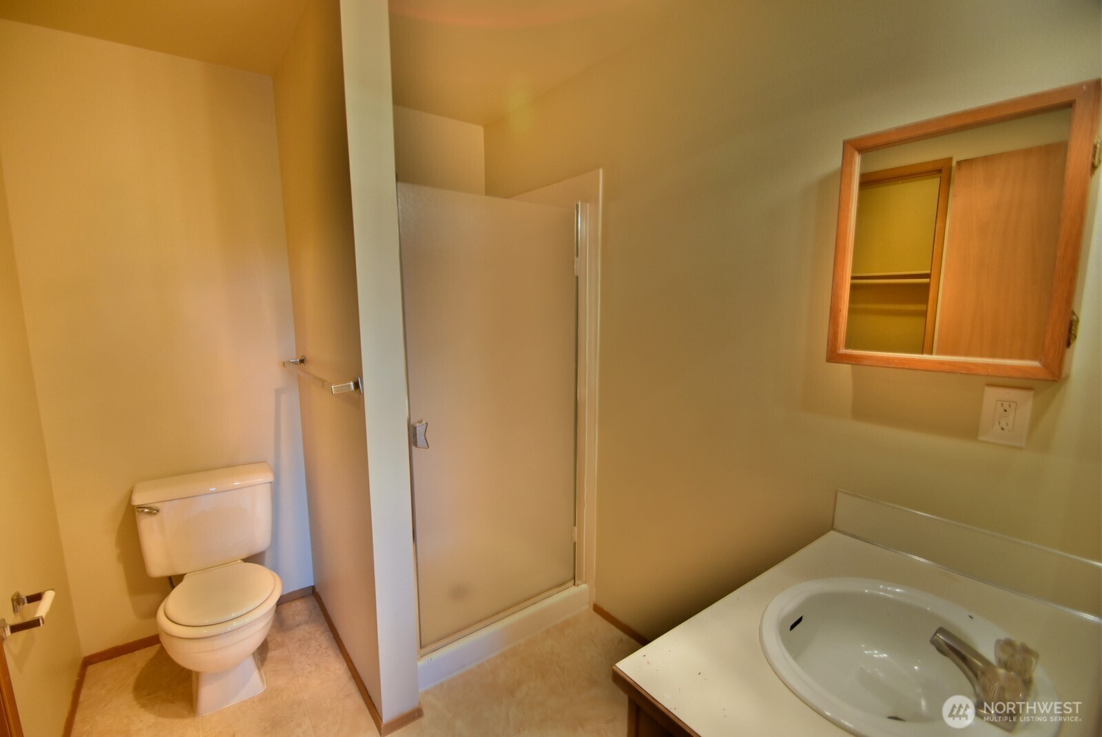 7616 200th Street Southwest, Unit 2 Edmonds, WA 98026 - Photo 8 of 12 a bathroom with a sink and a toilet