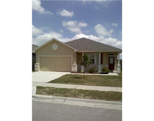 1025 Livermore Street Portland, TX 78374 - Photo 1 of 1 a front view of a house with a garden