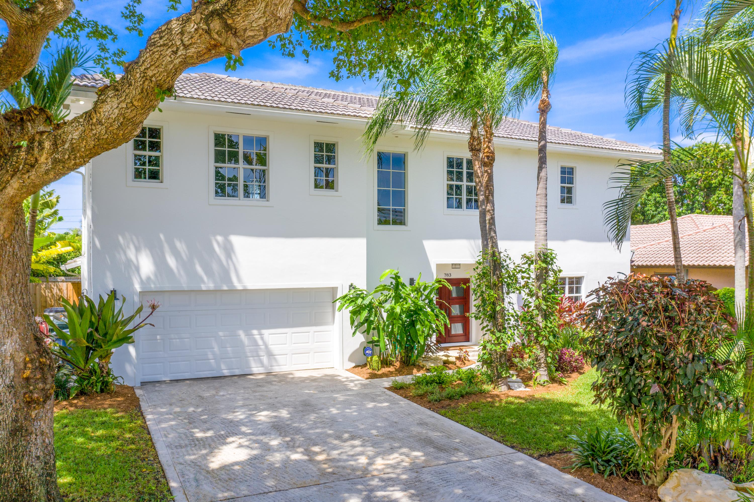 783 Toledo Drive Boca Raton, FL 33432 - Photo 3 of 90 1-Drone-Front-of-Home-1