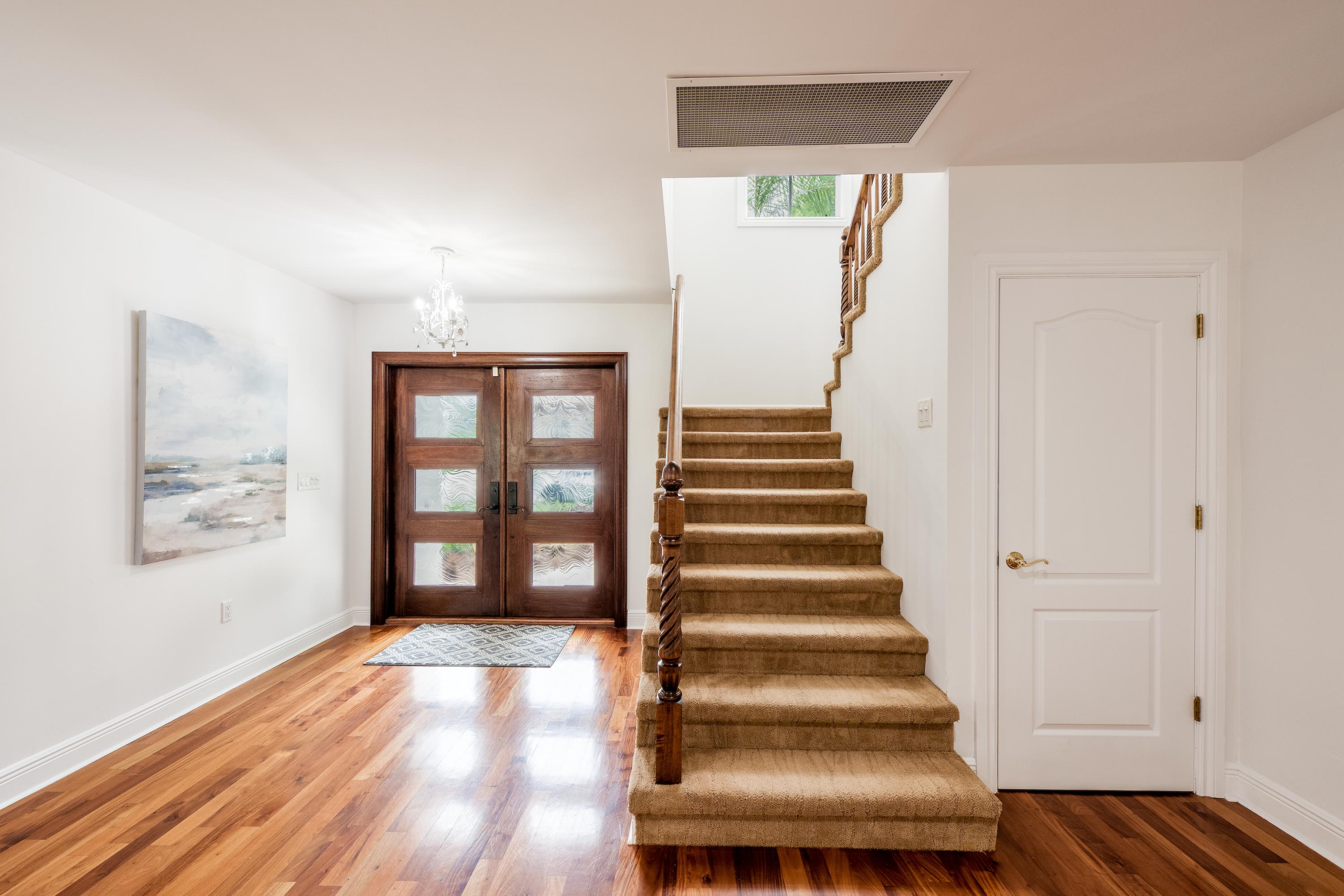 783 Toledo Drive Boca Raton, FL 33432 - Photo 6 of 90 Entryway-Facing-Front-Door-And-Stairs
