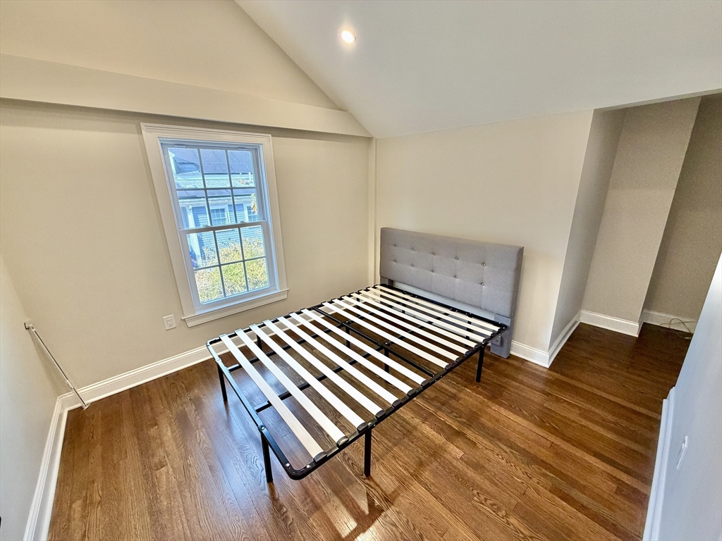 48 Springs Road, Unit RD Bedford, MA 01730 - Photo 16 of 27 a view of a room with wooden floor