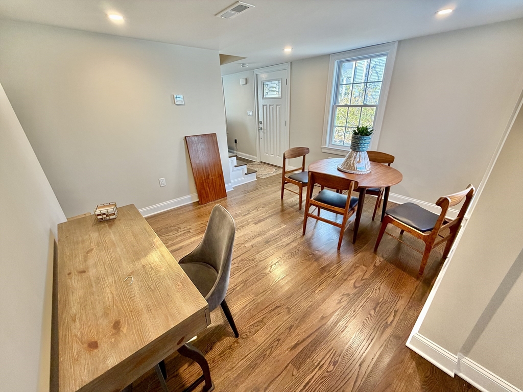 48 Springs Road, Unit RD Bedford, MA 01730 - Photo 8 of 27 a workspace with furniture and wooden floor