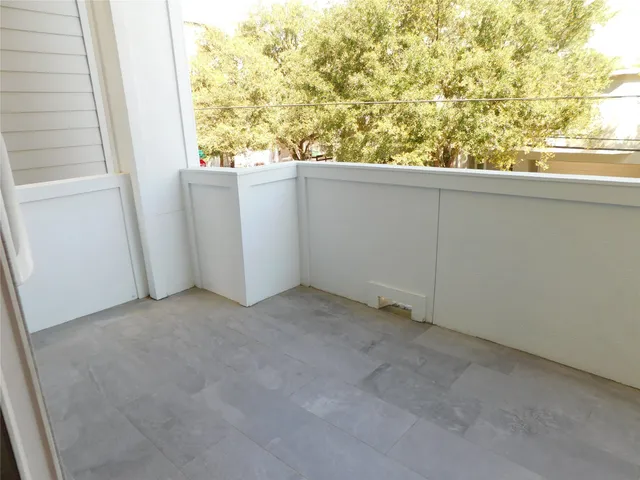 wooden floor and window in an empty room