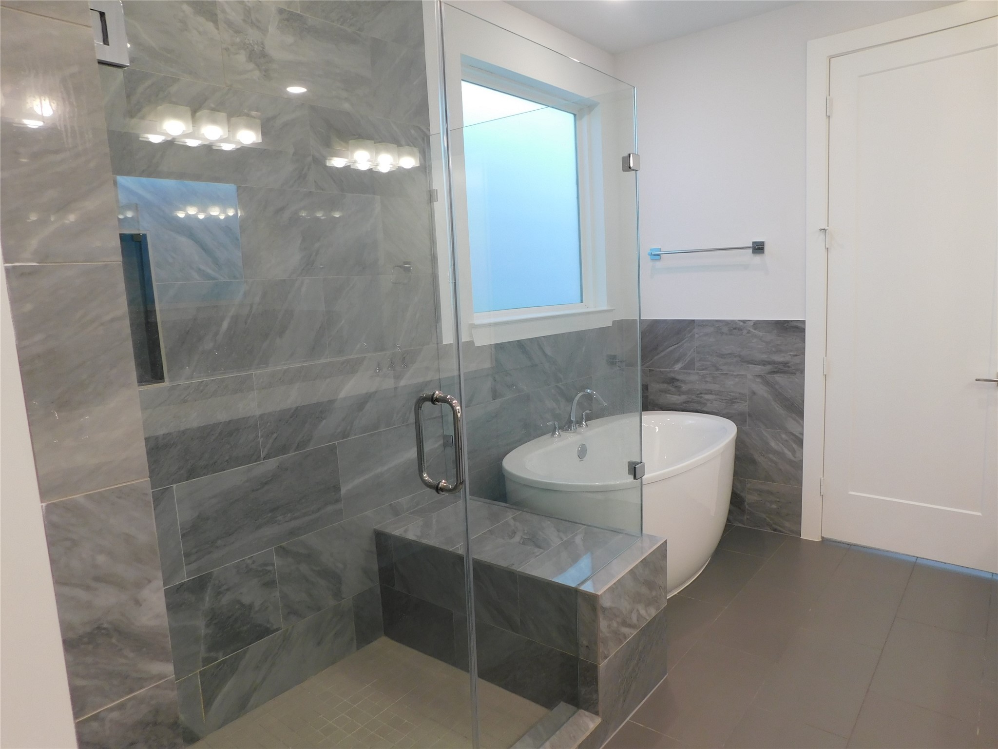 4223 Eli Street Houston, TX 77007 - Photo 44 of 46 a bathroom with a sink a toilet and shower