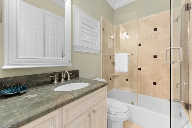 a dining room with furniture a rug and wooden floor