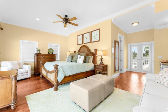 a view of a house with swimming pool and sitting area