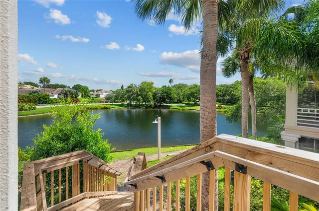 a front view of a house with a lake view