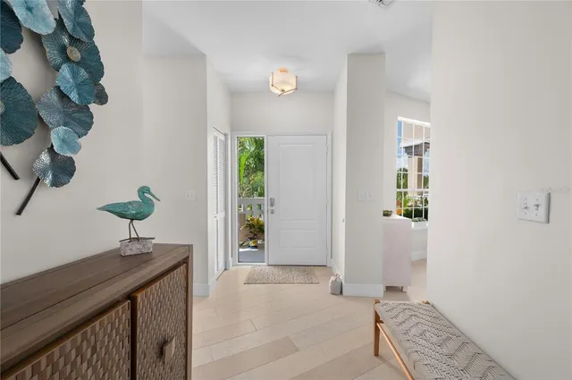 a view of an entryway with wooden floor