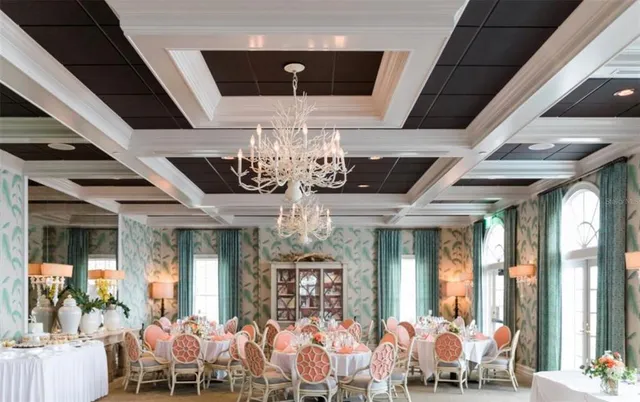 a room with lots of furniture and windows