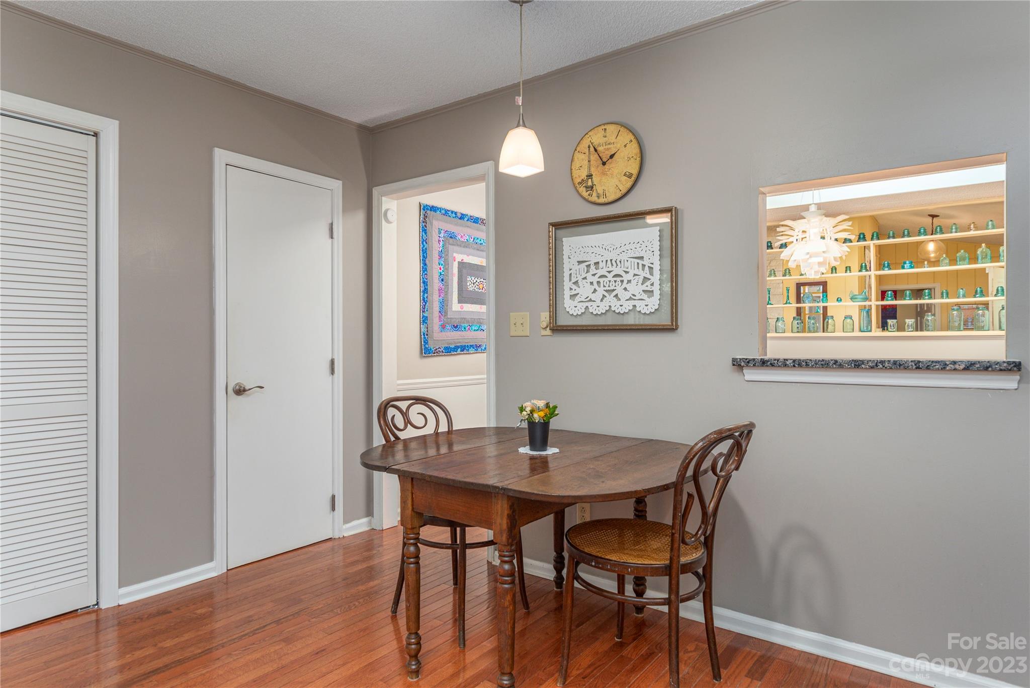 6 Cambridge Road Asheville, NC 28804 - Photo 12 of 35 a view of a dining room with furniture and wooden floor