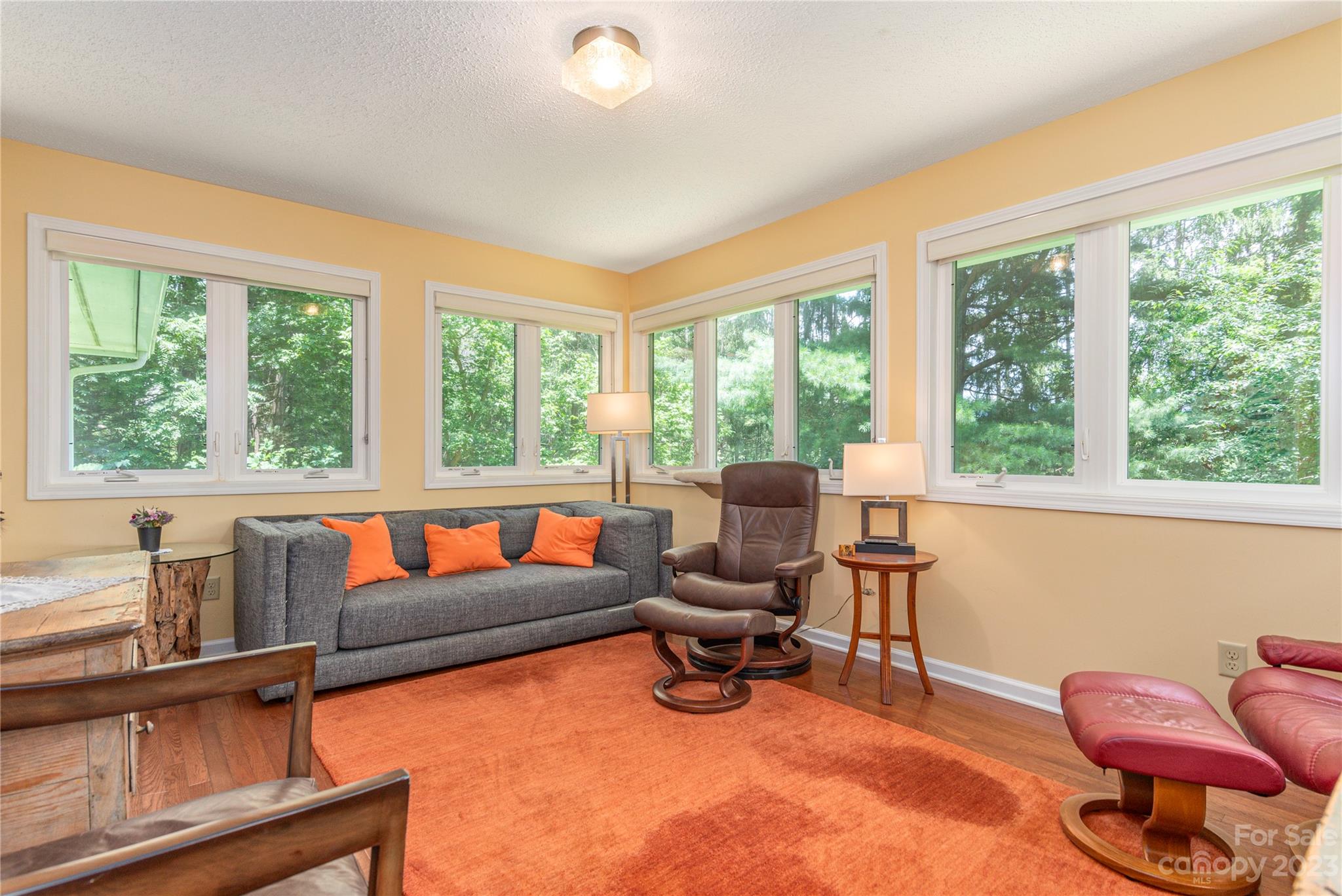 6 Cambridge Road Asheville, NC 28804 - Photo 15 of 35 a living room with furniture and a large window