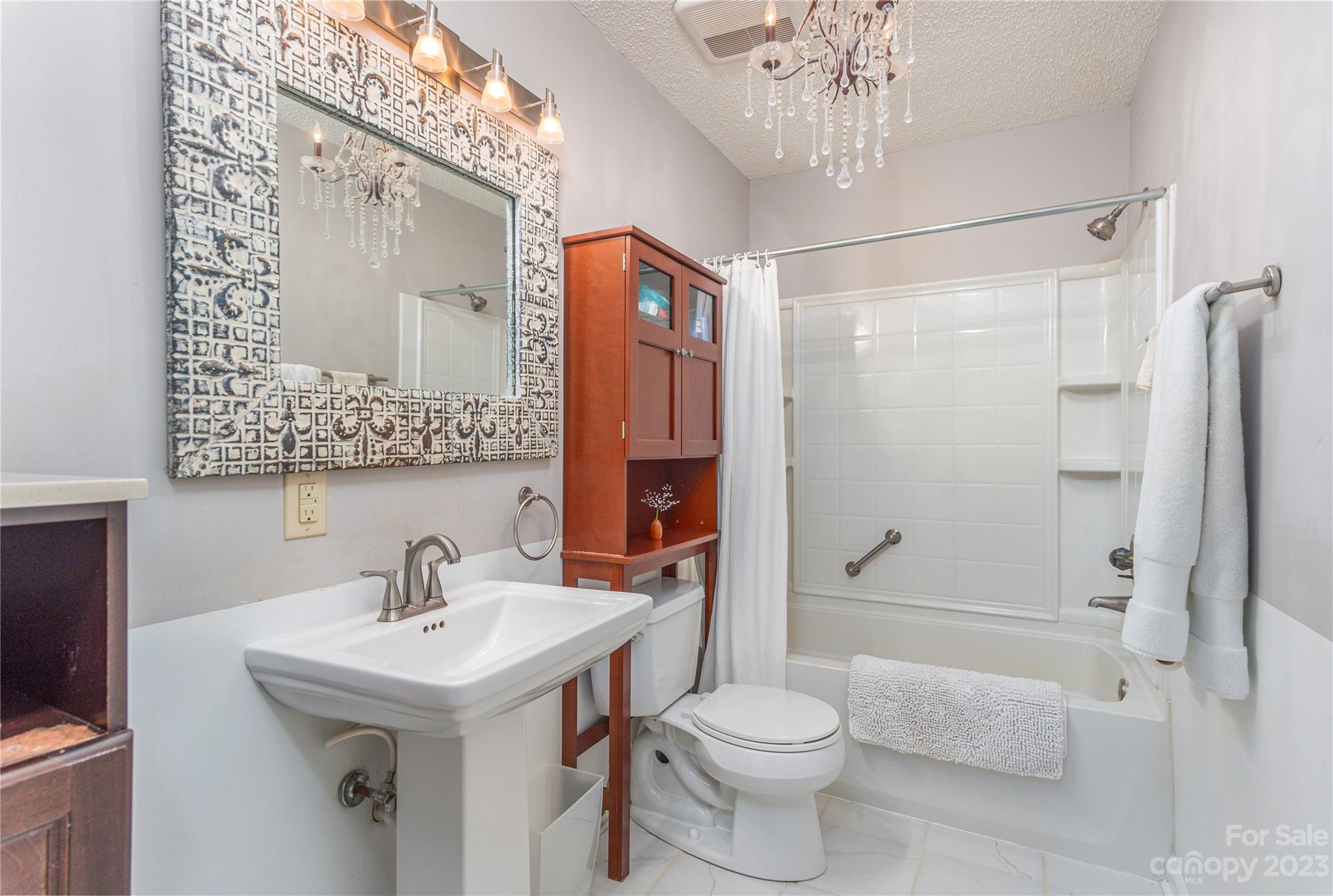 6 Cambridge Road Asheville, NC 28804 - Photo 17 of 35 a bathroom with a sink toilet and shower