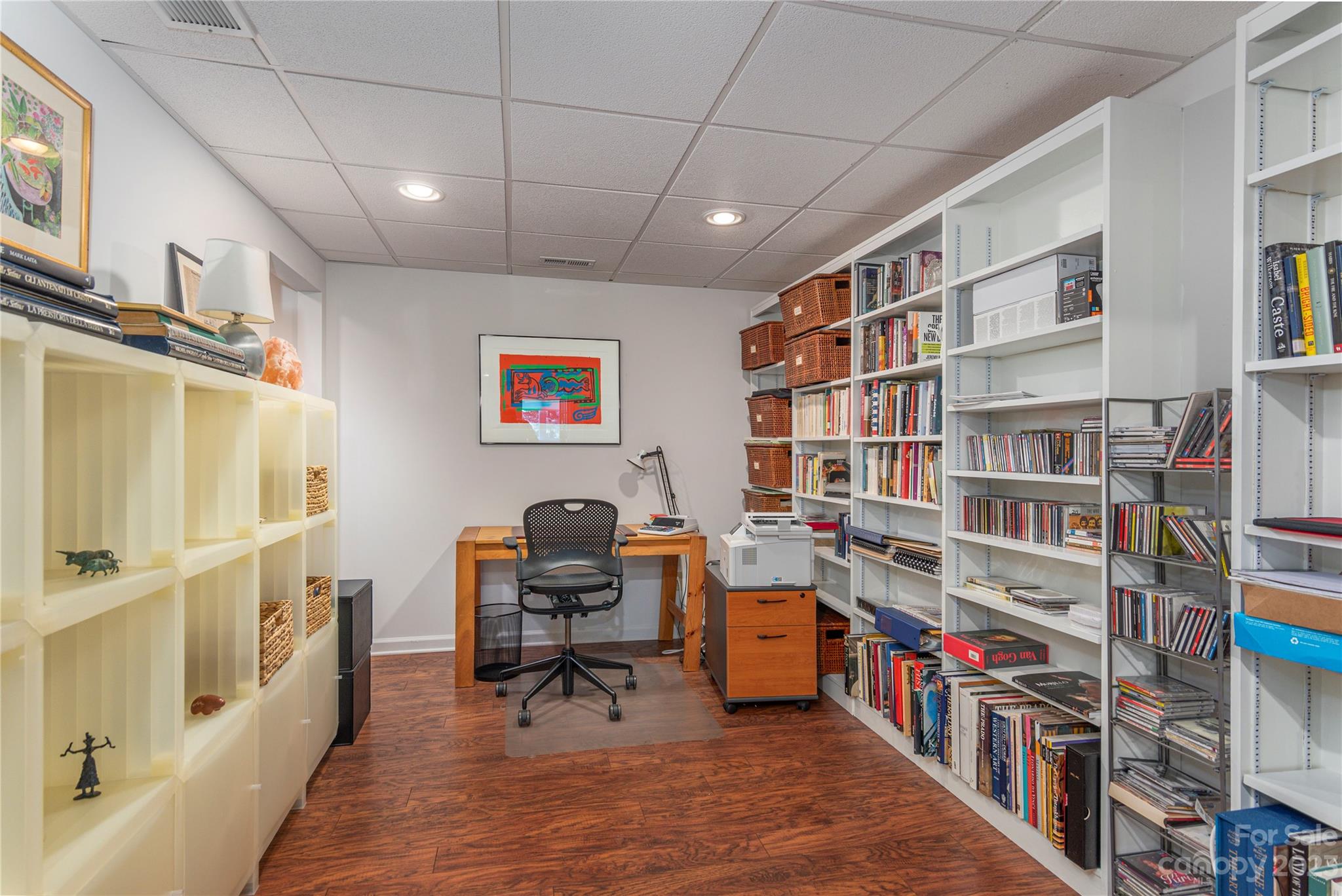 6 Cambridge Road Asheville, NC 28804 - Photo 20 of 35 a reading room with furniture and book shelf
